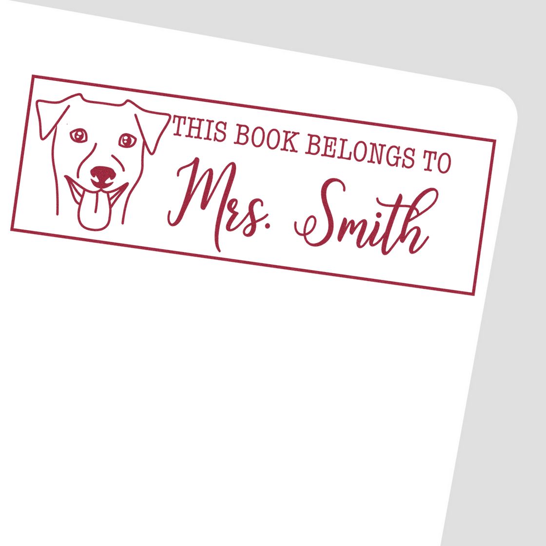Maroon custom book stamp and seal with dog outline, This Book Belongs to Mrs. Smith on white background.
