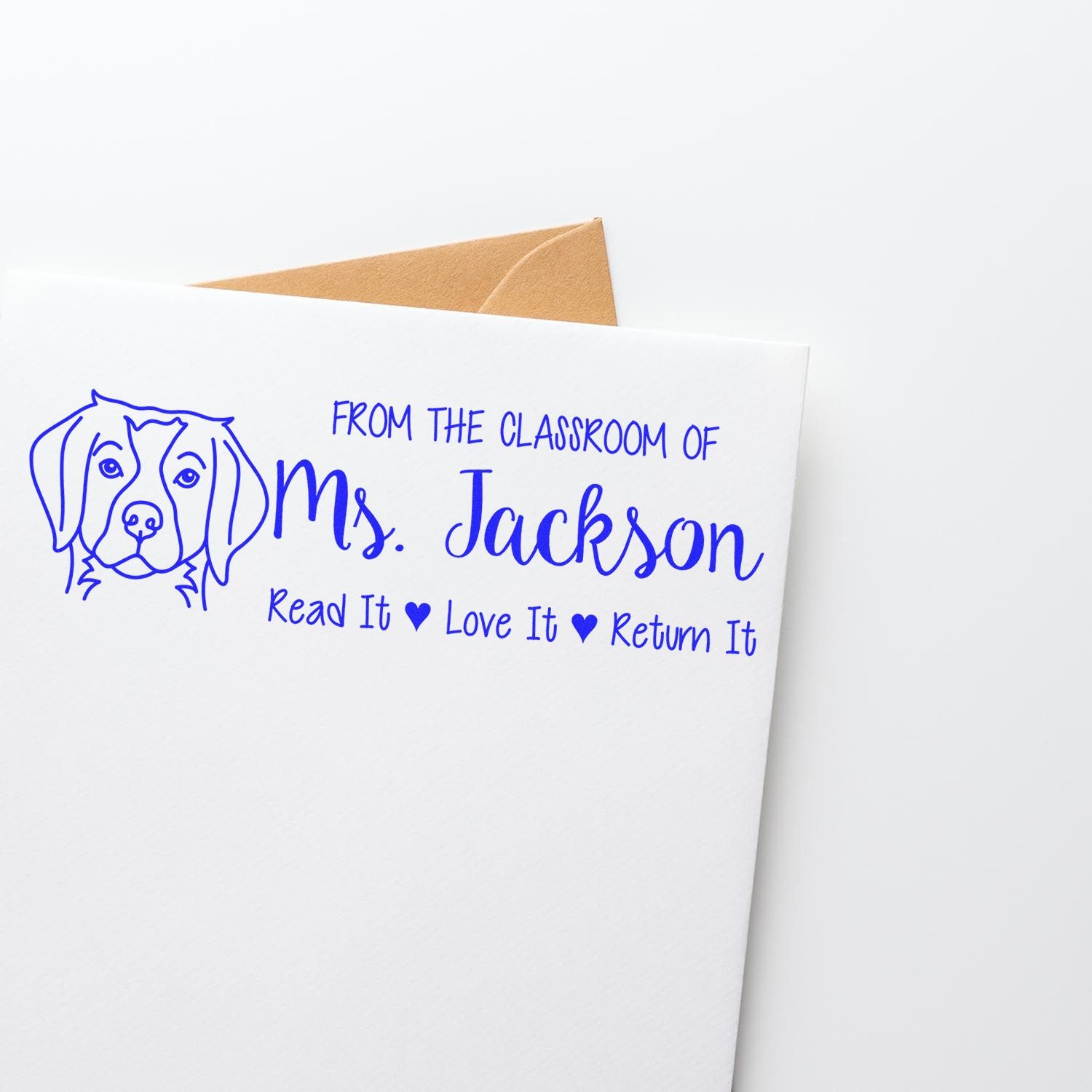 Blue dog stamp and seal for Mrs. Jackson, From the Classroom Of with Read It, Love It, Return It on white paper and tan envelope
