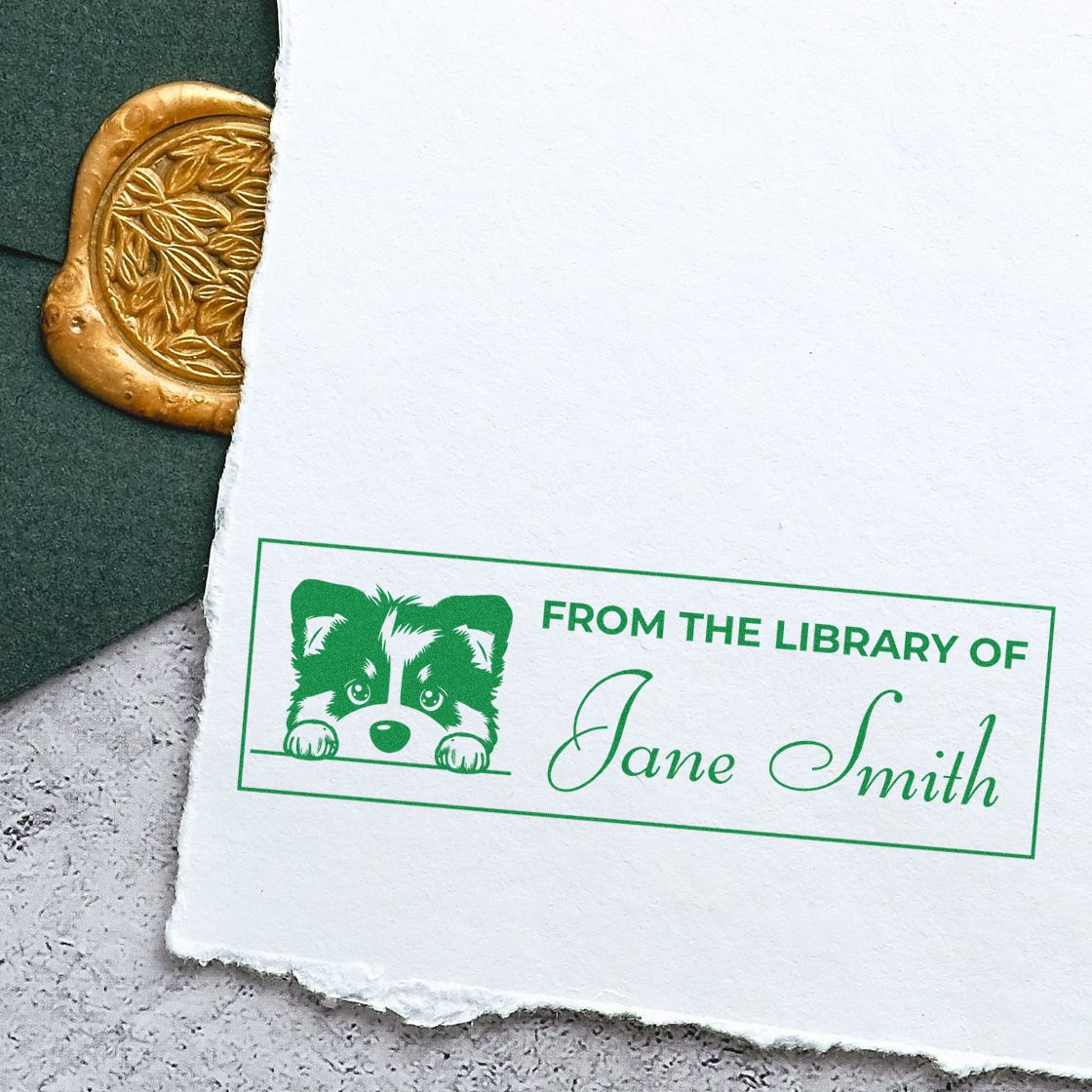 Green custom library stamp with raccoon design reads From the Library of Jane Smith beside a gold embossed seal.