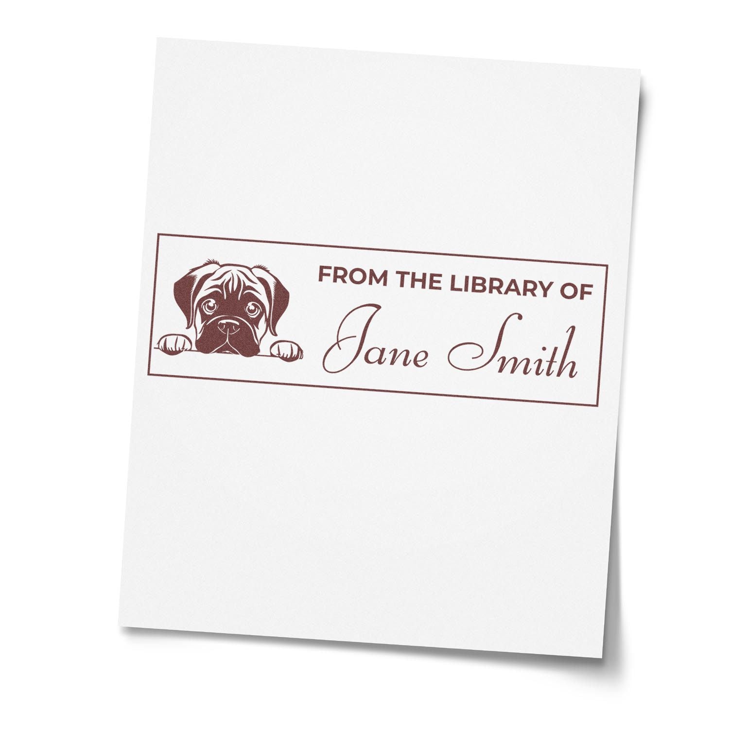 Brown custom library stamp on white paper with puppy illustration and From the Library of Jane Smith text.