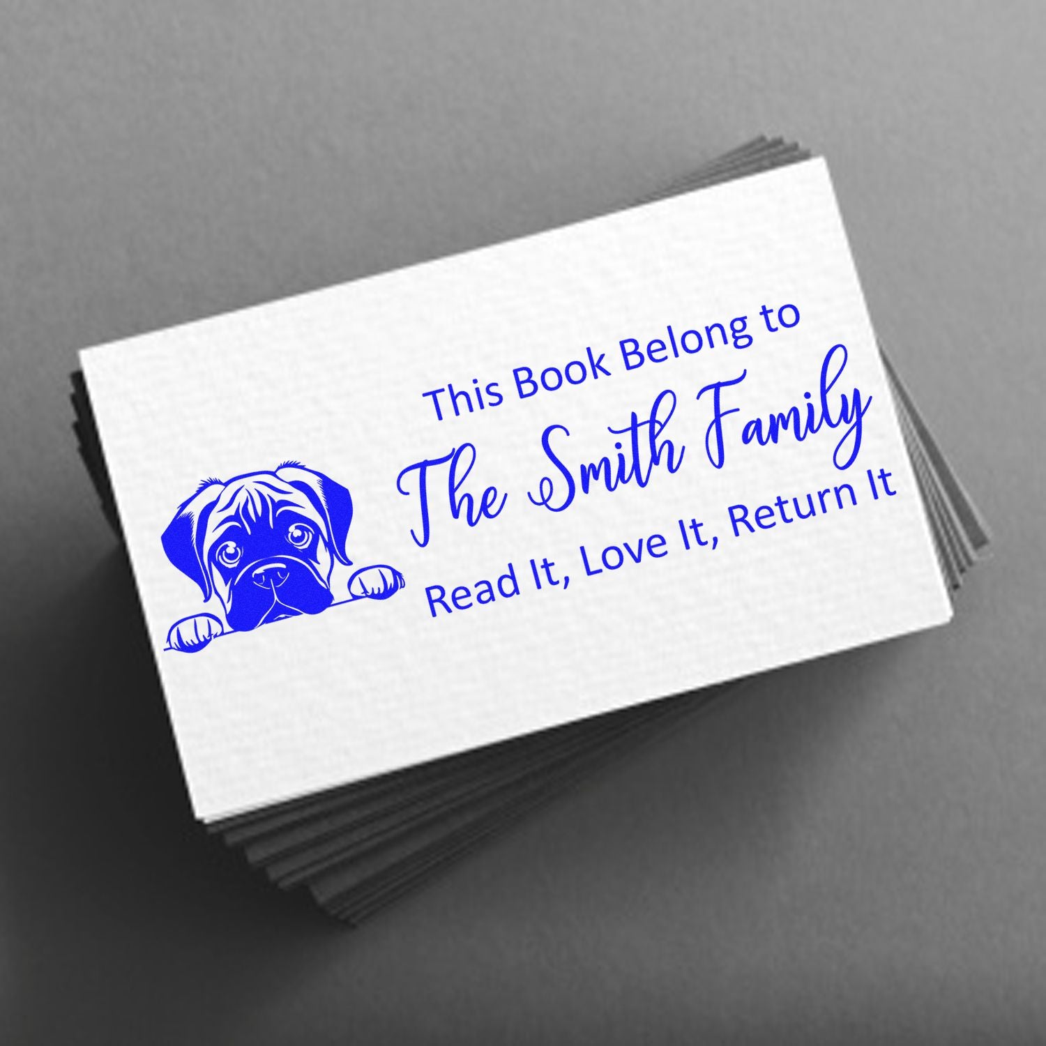 Custom blue dog book stamp seal on white cards for The Smith Family: Read It, Love It, Return It.