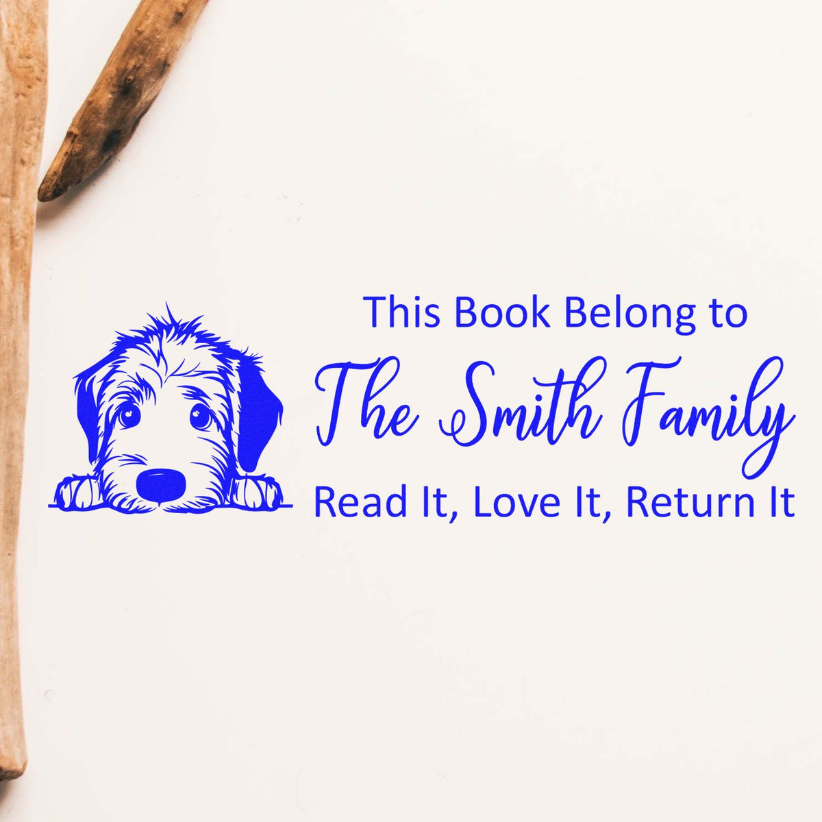 Blue custom book stamp seal with dog graphic and This Book Belong to The Smith Family return-it text