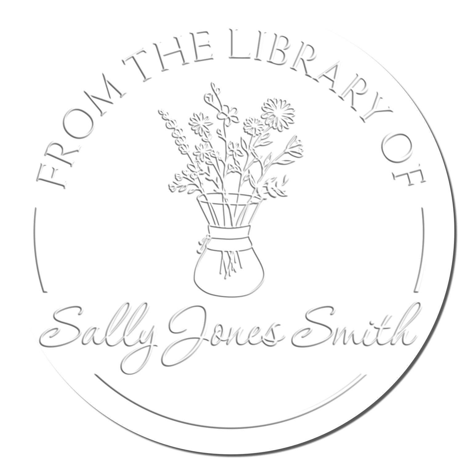 Round white custom library stamp seal with gray embossed text, floral bouquet in vase, and name Sally Jones Smith.