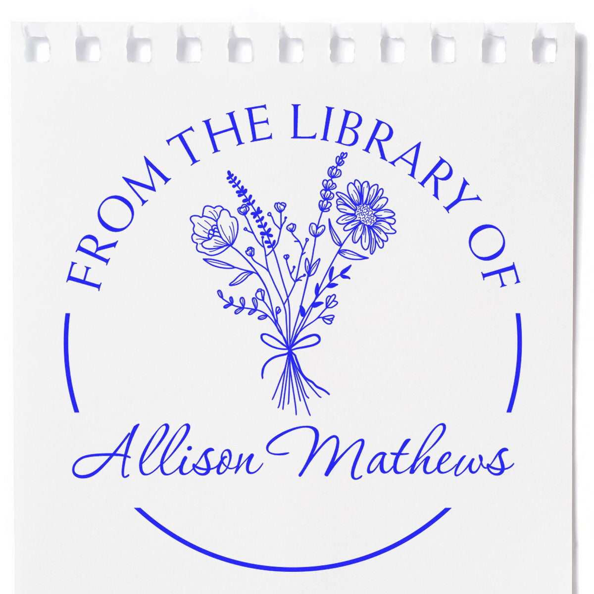Blue custom library stamp and seal on white with floral bouquet, reading From the Library of Allison Mathews.