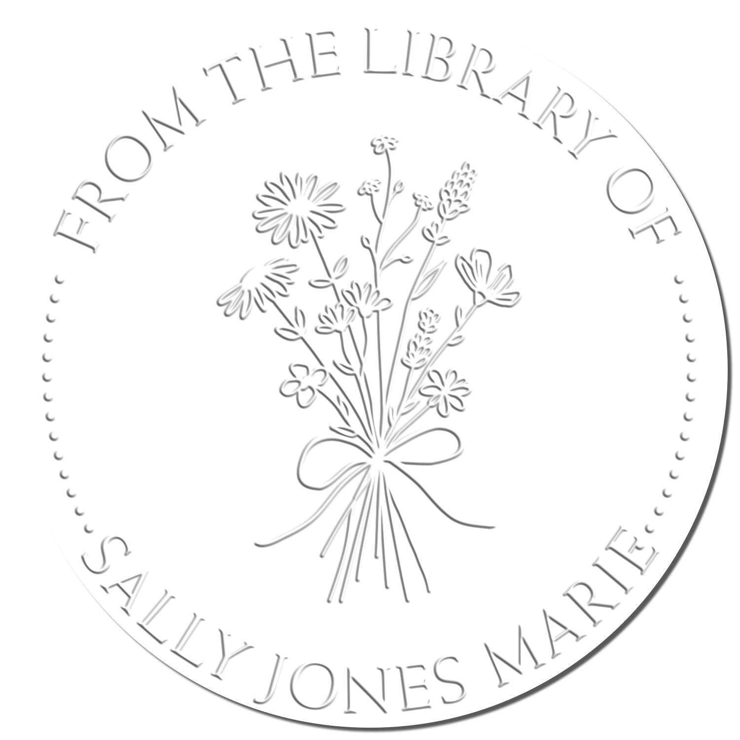 White circular library stamp seal with gray embossed floral bouquet and arched text From the Library of Sally Jones Marie.