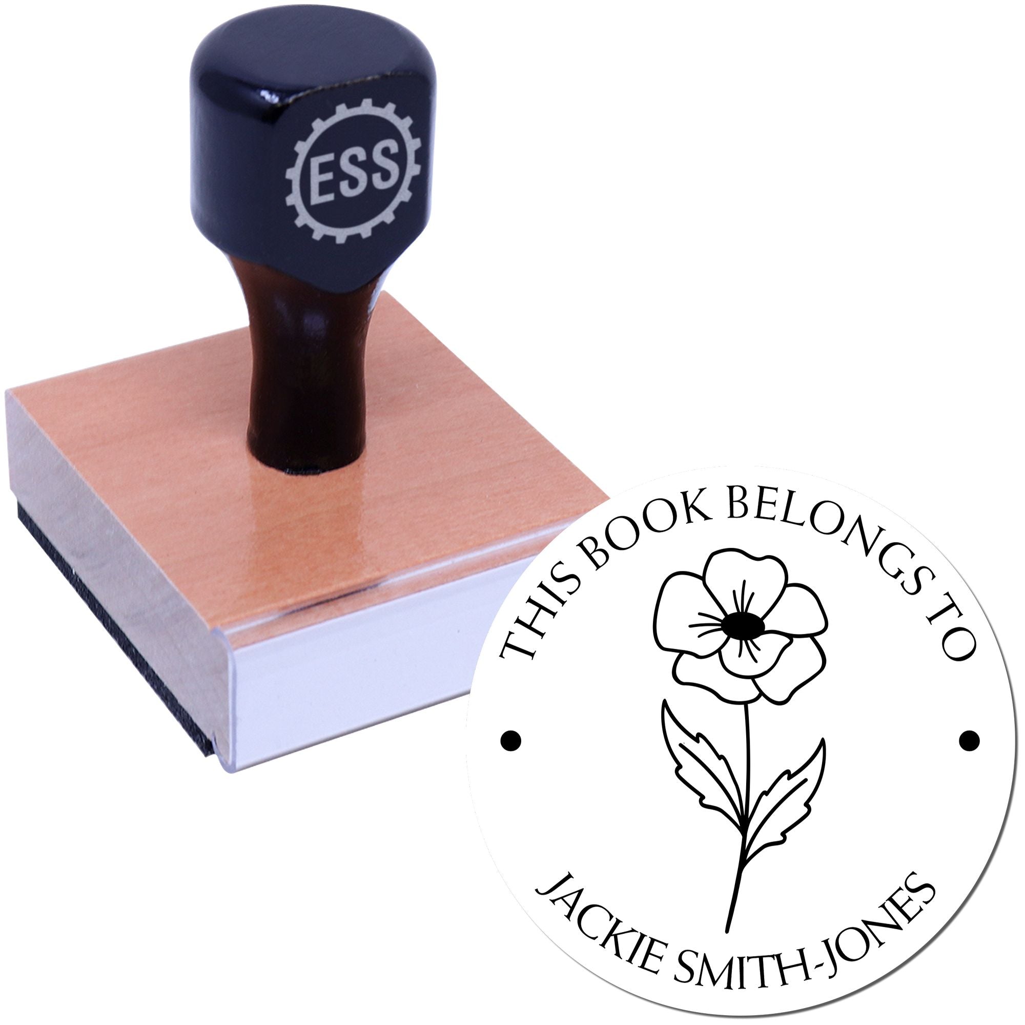 Dark blue ESS stamp on wood block beside white circular seal with black flower and custom text.