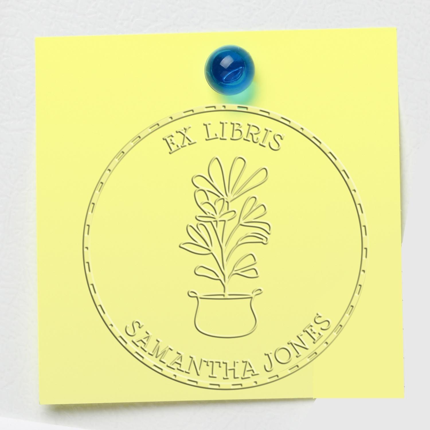 Yellow stamp and seal sheet with circular EX LIBRIS design, blue tack, and potted plant emblem for Samantha Jones