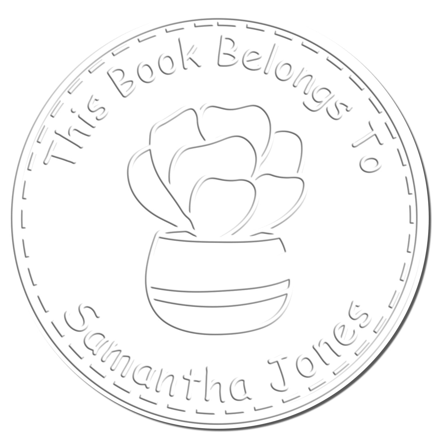 Circular gray book stamp seal with flower in a vase and text, This Book Belongs To Samantha Jones.
