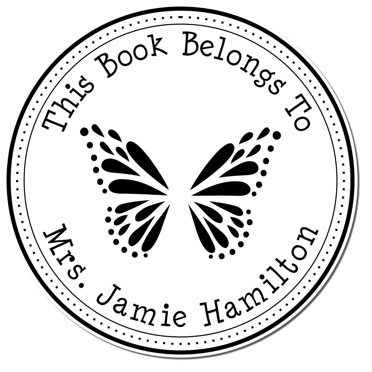 Black-and-white circular book ownership stamp seal with butterfly and text: This Book Belongs To Mrs. Jamie Hamilton.