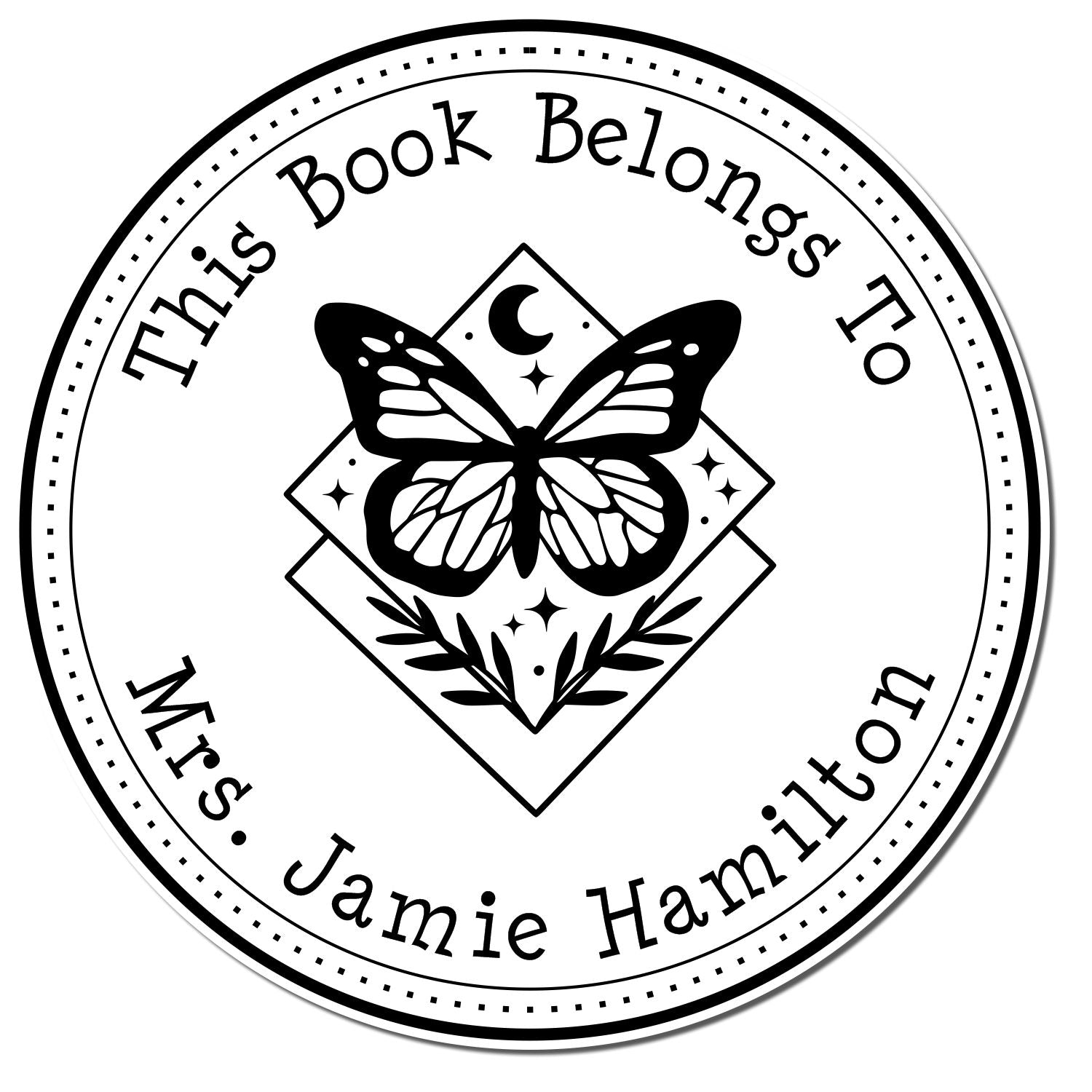 Black-and-white circular book stamp seal with butterfly, moon, stars, and leafy center reading This Book Belongs To Mrs. Jamie Hamilton.