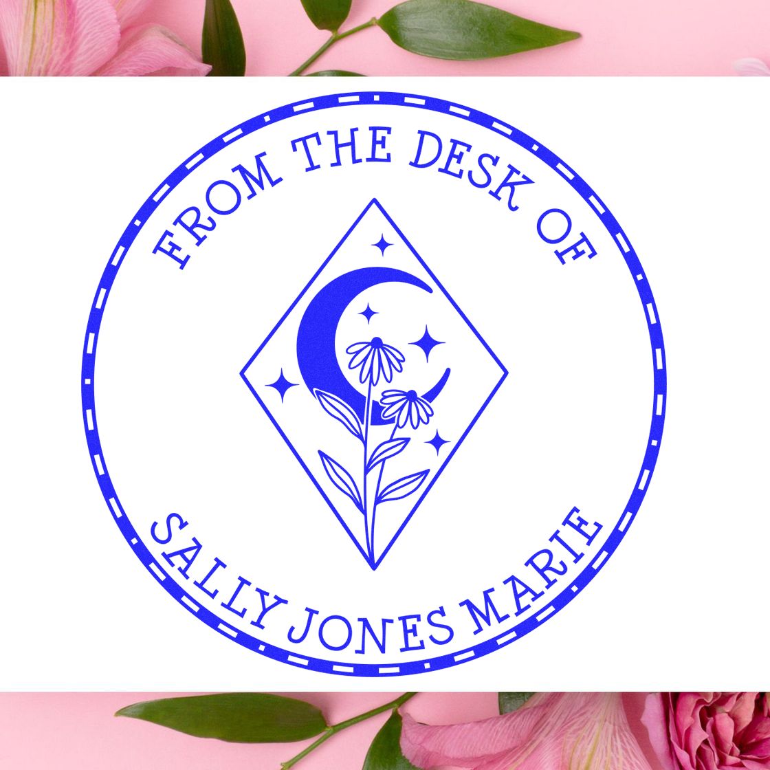 Blue circular stamp seal with moon, flowers and stars, reading FROM THE DESK OF SALLY JONES MARIE, on white with pink floral border.