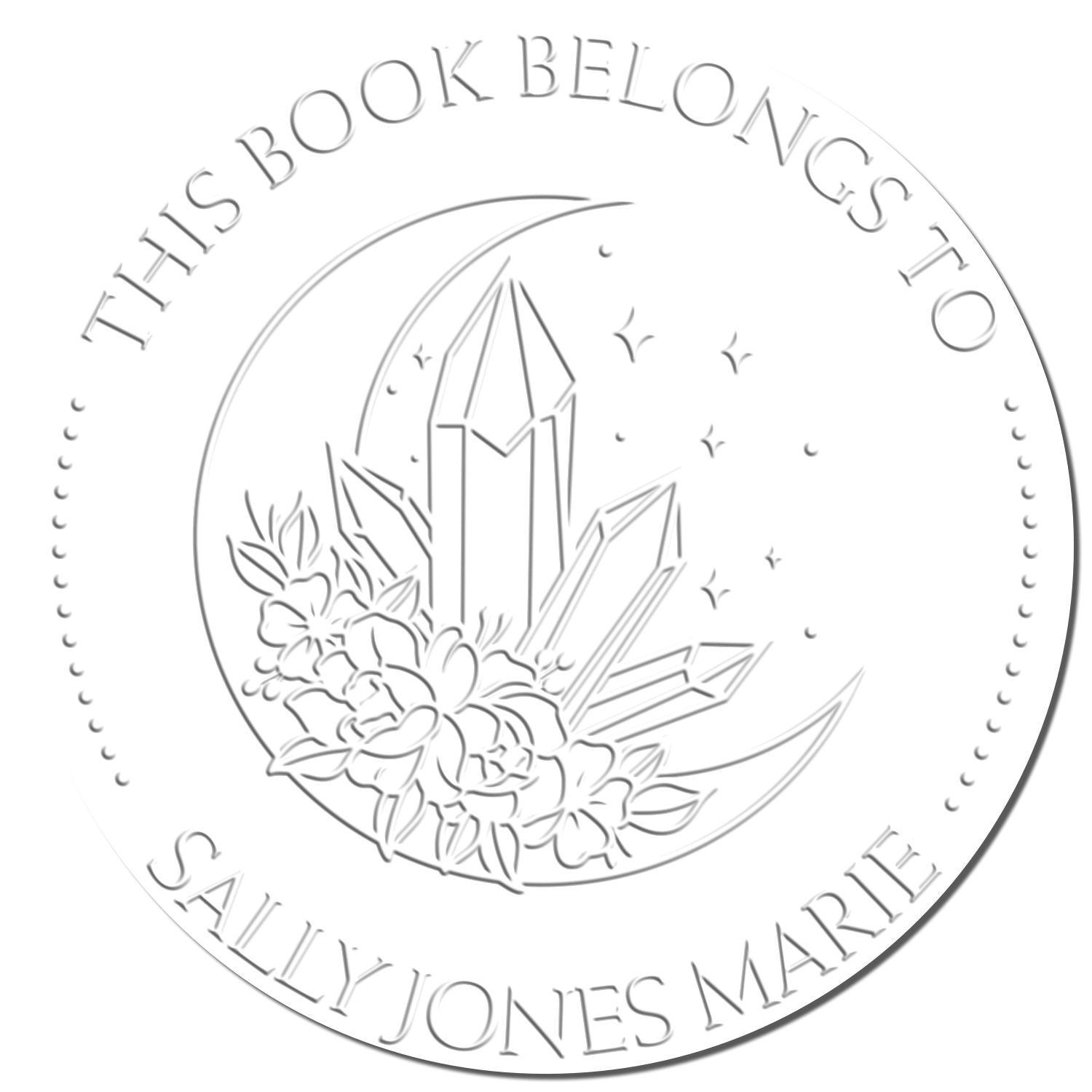 Embossed silver-white book seal stamp with crescent moon, crystals and flowers; This Book Belongs to Sally Jones Marie.