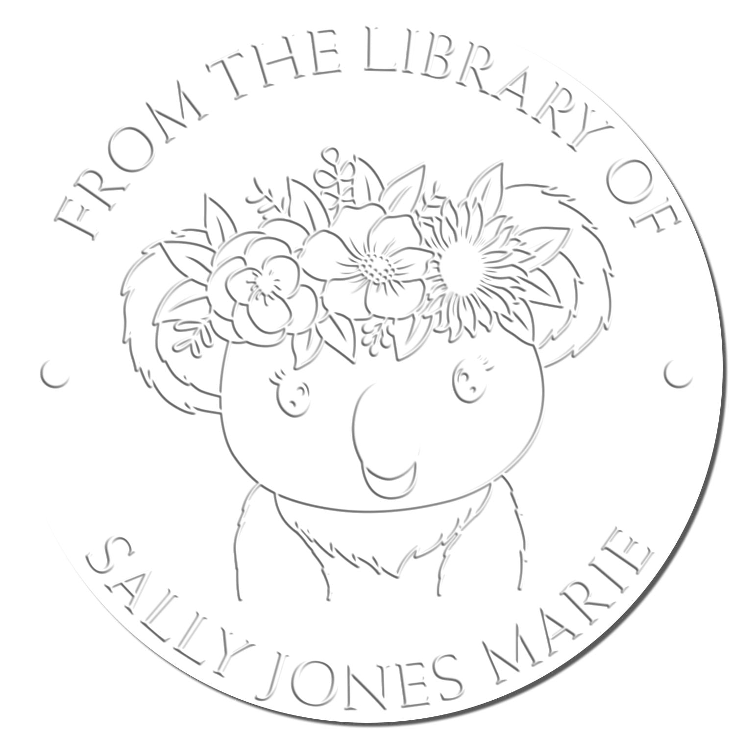 White circular embossing seal stamp with line-art koala, floral crown, and curved From the Library of Sally Jones Marie text.
