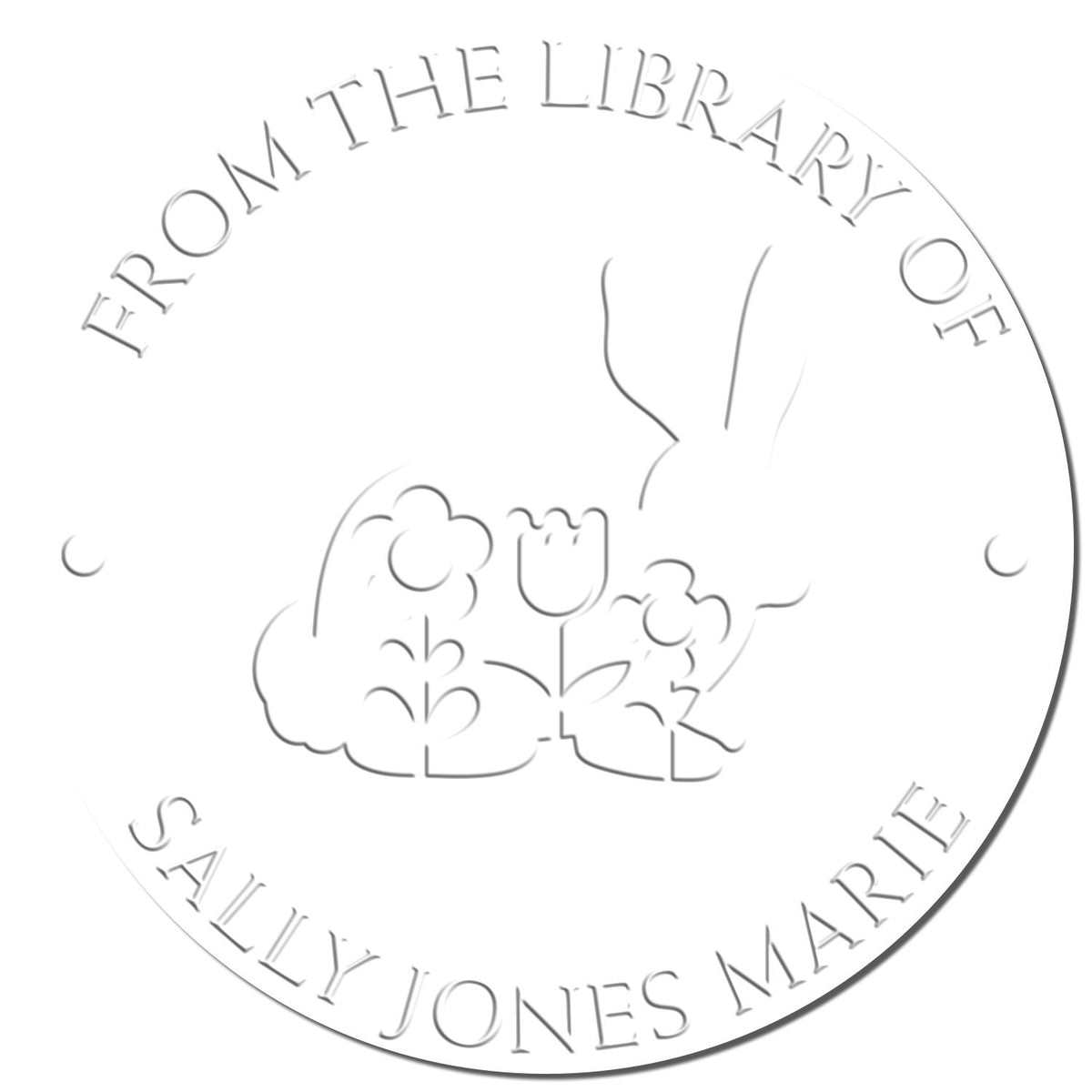 Close-up of ESS Timid Bunny animal stamp with custom embossed library book imprint featuring a cute bunny design.