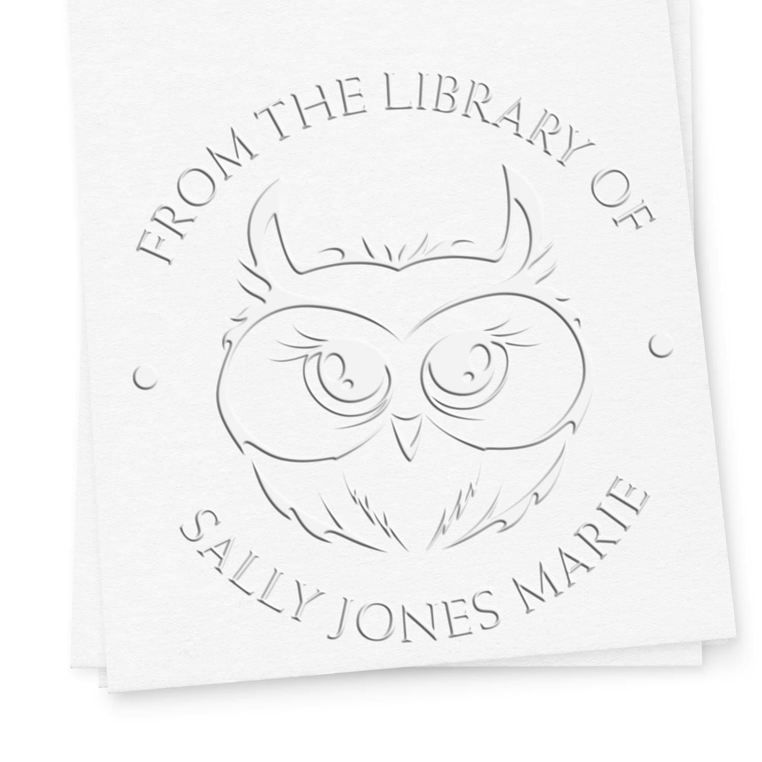 White embossed library stamp seal with owl and gray lettering, reading From the Library of Sally Jones Marie.