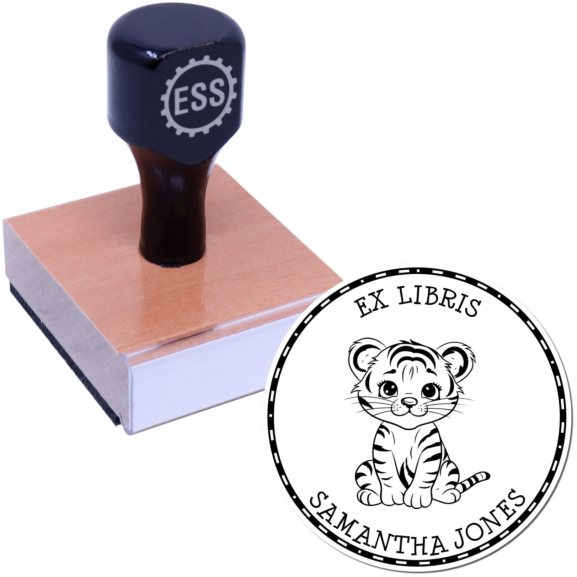 Dark blue ESS rubber stamp on wooden block with round tiger ex libris seal reading Samantha Jones.