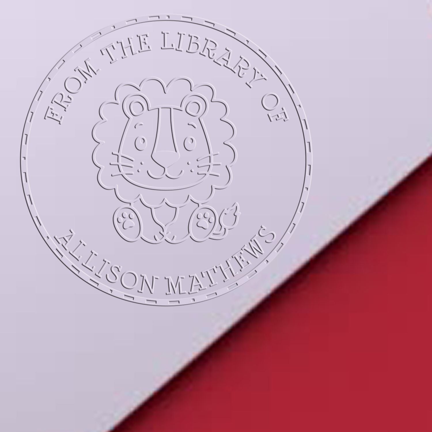 Embossed lavender circular library stamp seal with lion emblem and From the Library of Allison Matthews text, red corner accent.
