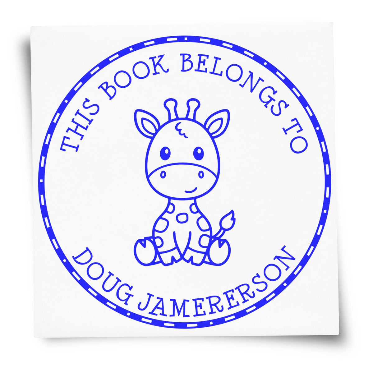 Blue circular stamp seal reading This Book Belongs to Doug Jamerson, with a smiling giraffe on white background.