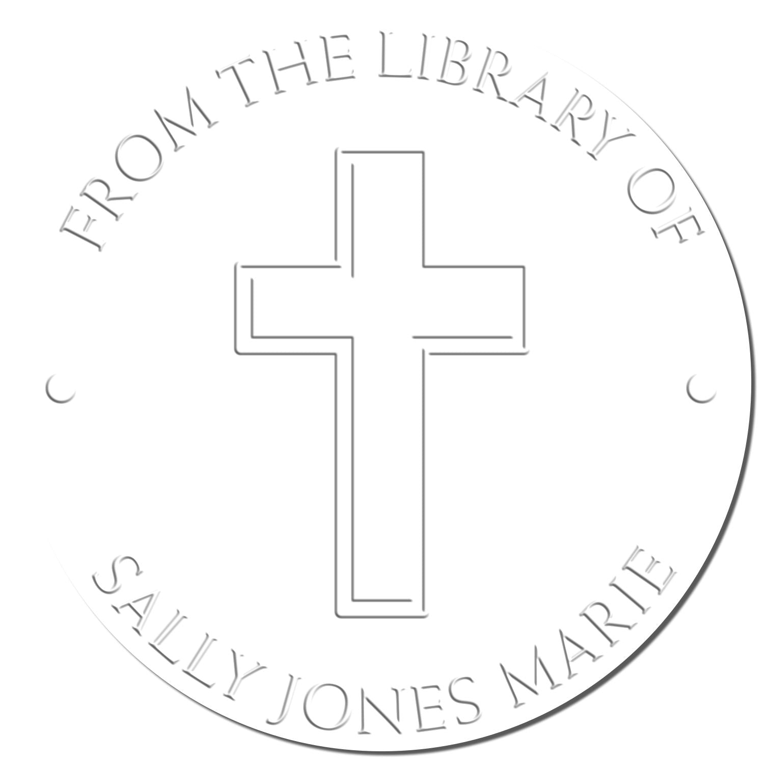 White circular library stamp seal with gray embossed cross and curved text reading From the Library of Sally Jones Marie.