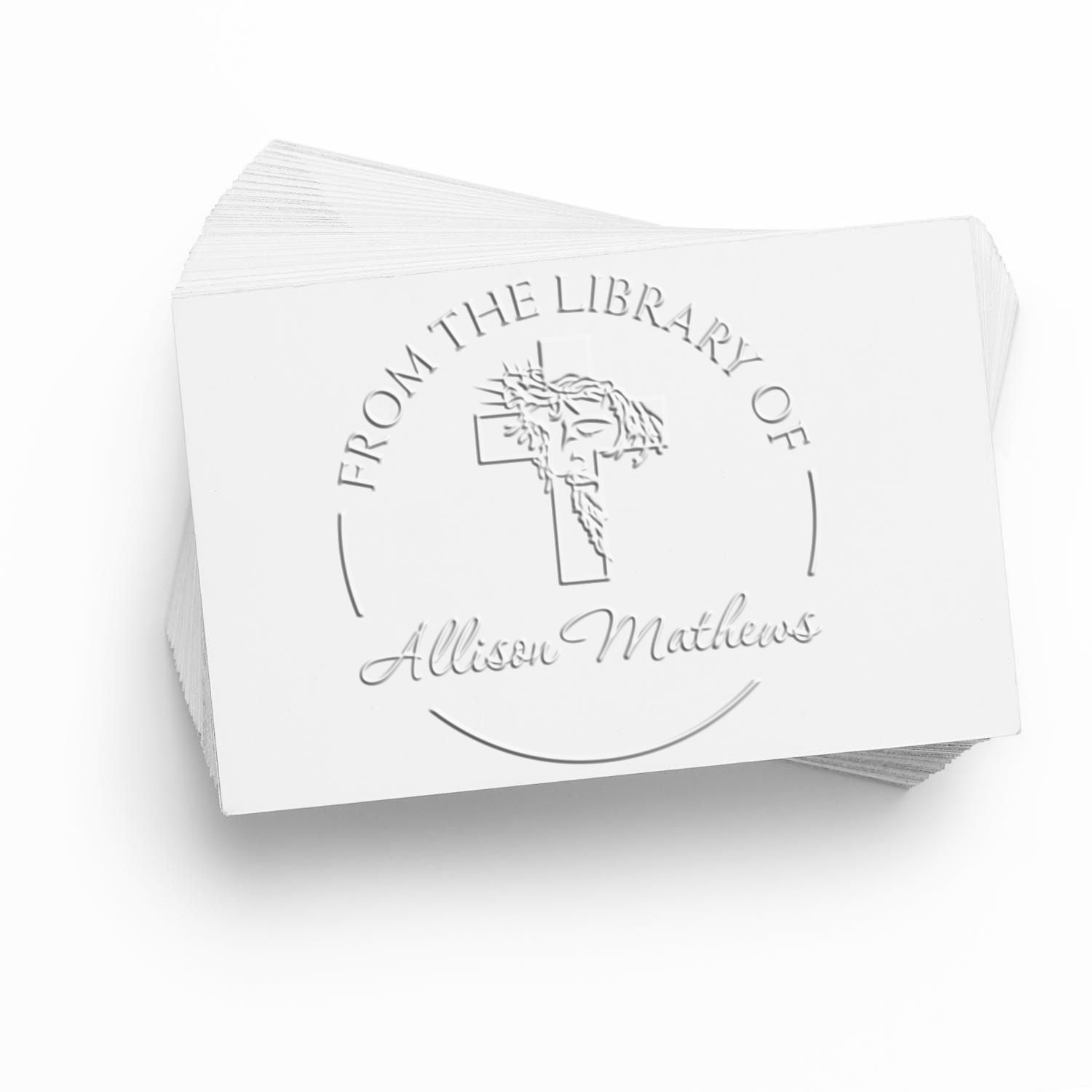 White embossed stamp and seal cards with circular library cross seal and Allison Matthews text on a clean stack.