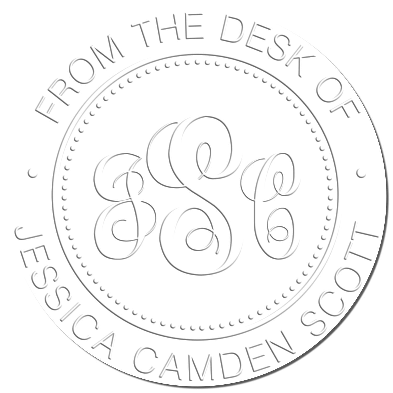 White circular stamp seal with gray embossed JCS monogram and curved text, From the Desk of Jessica Camden School.