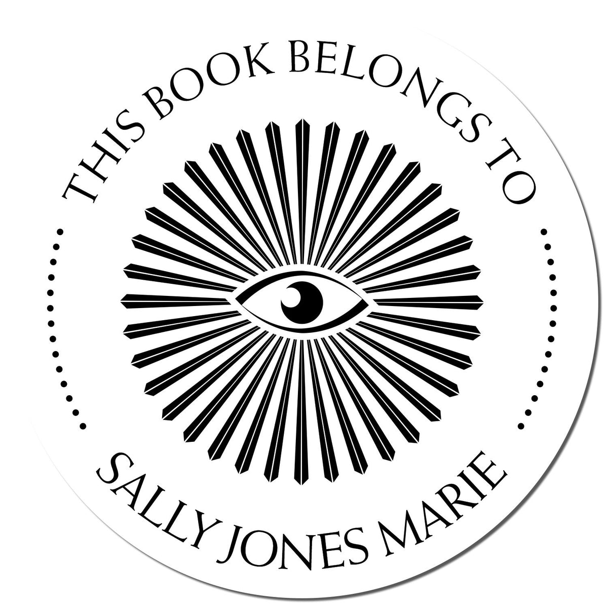 Black-and-white circular bookplate stamp seal with eye and sunburst, reading This Book Belongs to Sally Jones Marie.