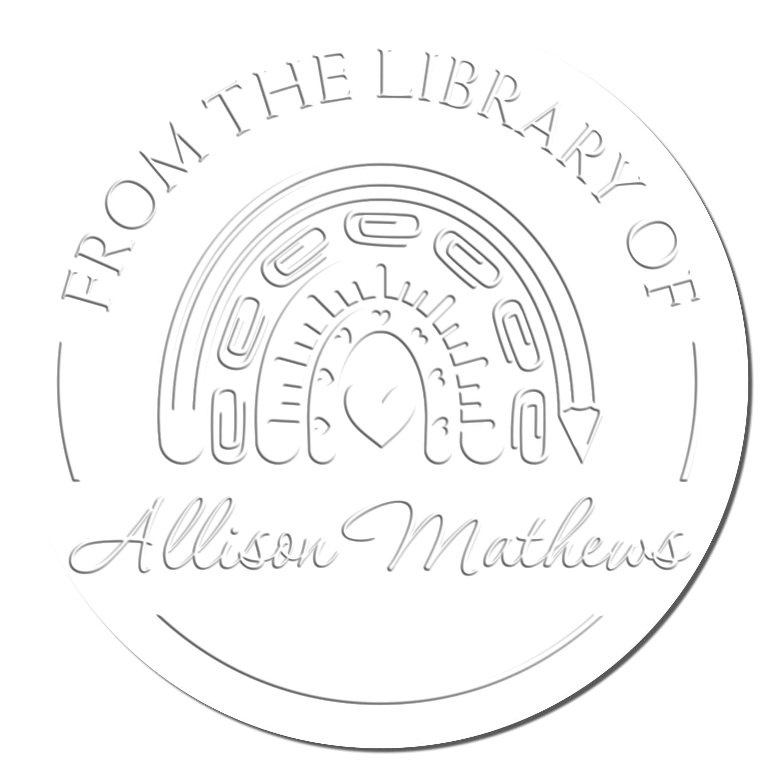 Circular white embossed silver-toned library stamp seal with rainbow and book icons, reading "From the Library of Allison Mathews"