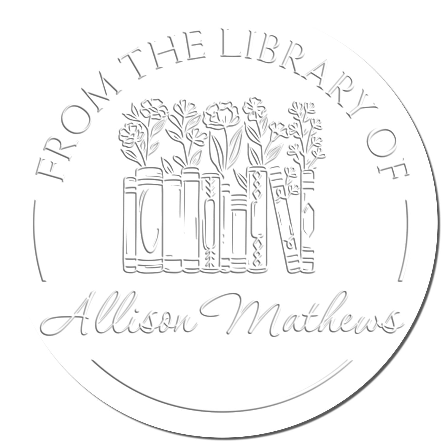 Round library book embosser seal, white and gray, with books and flowers, reading From the Library Of Allison Mathews