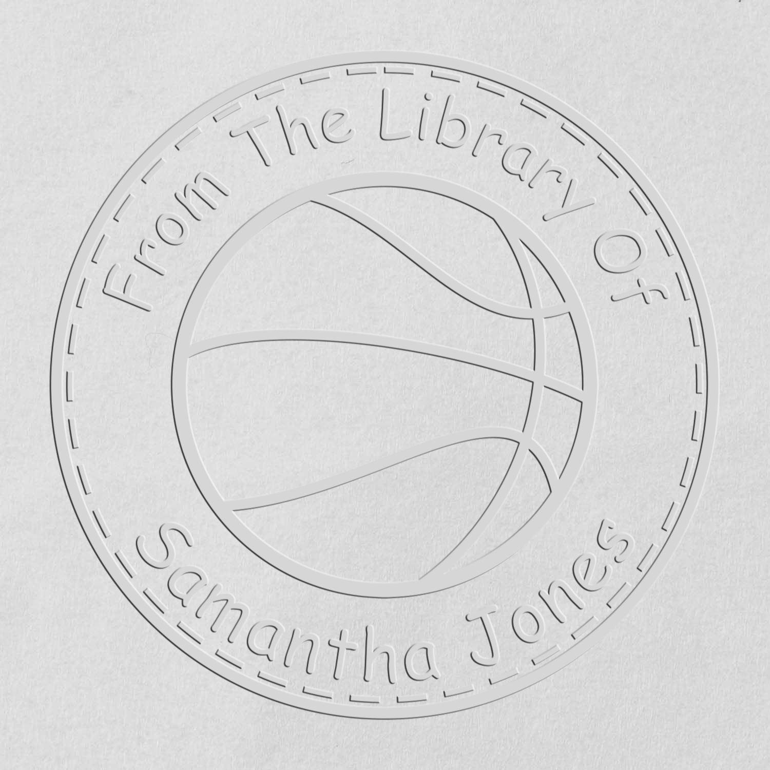 Embossed white circular library stamp seal with basketball icon and raised text, From The Library Of Samantha Jones.