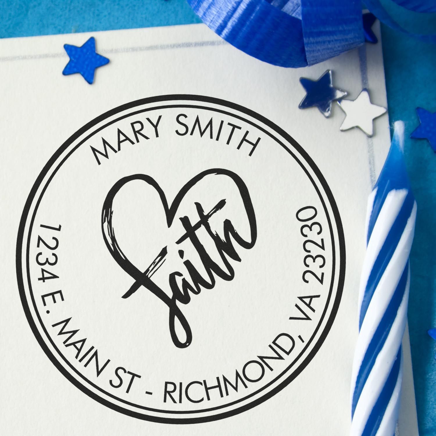 Black custom stamp seal for Mary Smith with heart design, blue ribbon, and blue-white star accents on white paper.