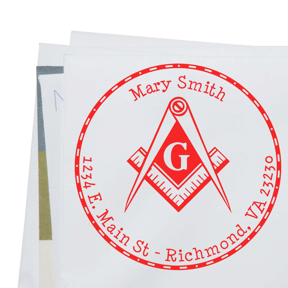 White envelope with a red custom stamp and seal for Mary Smith, featuring a compass and square.