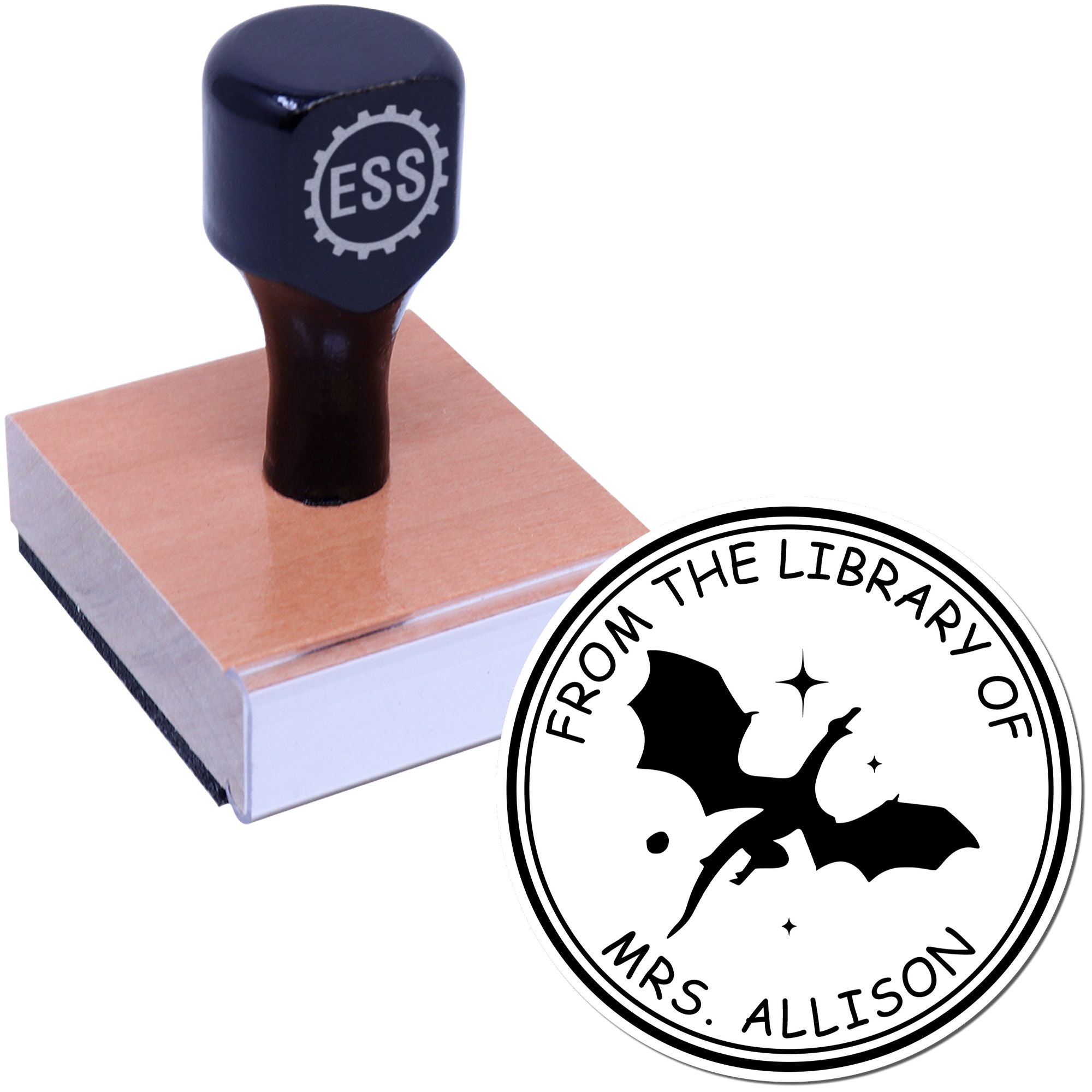 Dark navy self-inking stamp on wooden block beside circular library seal with bat silhouette and Mrs. Allison text.