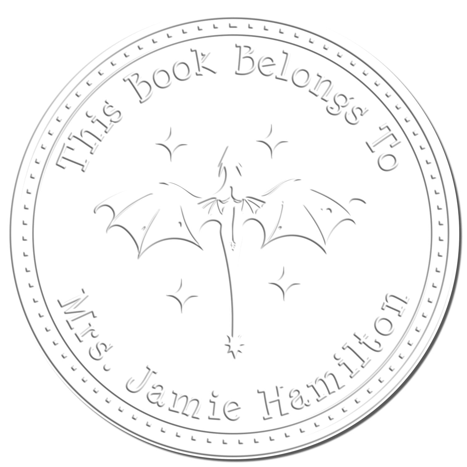 Circular gray bookplate stamp seal with bat graphic and This Book Belongs to Jamie Hamilton text on white background.