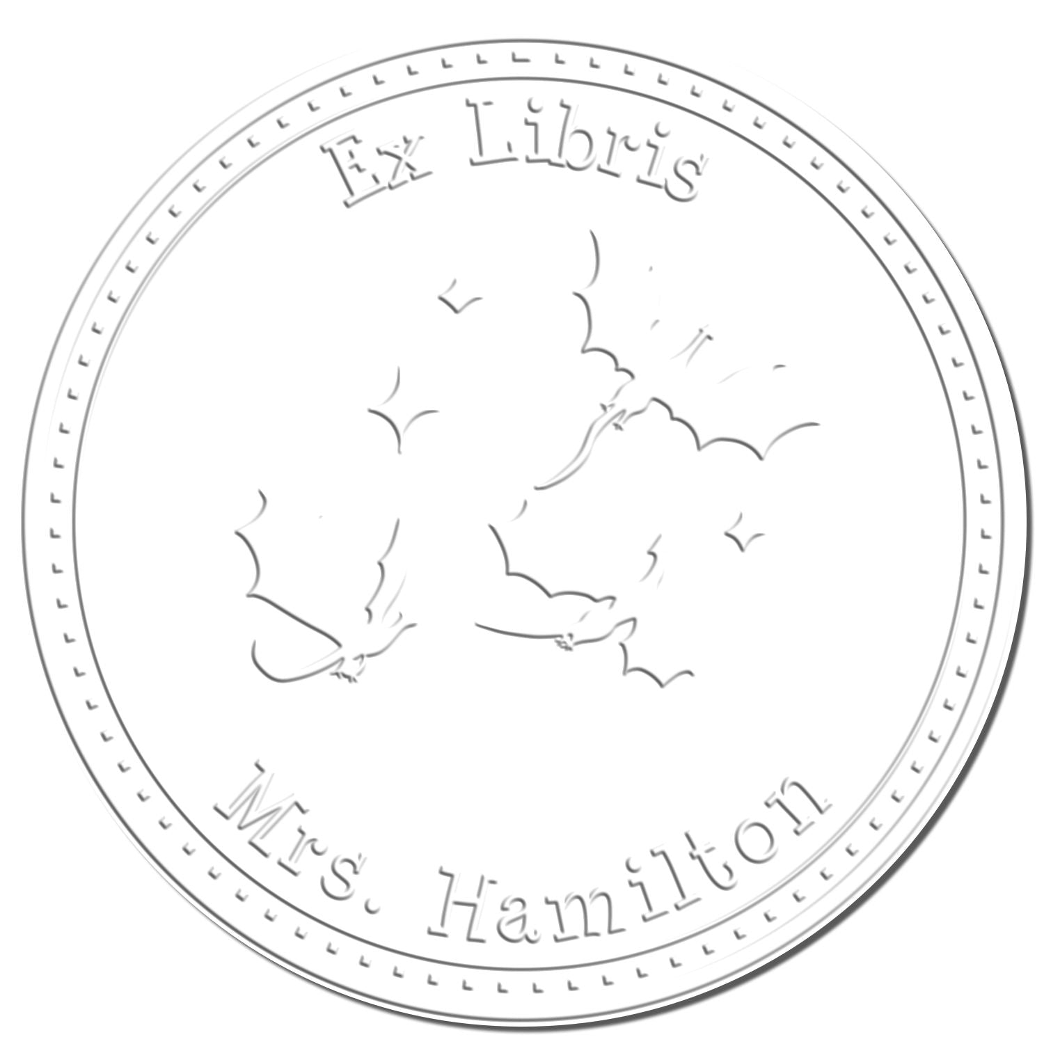 White embossed circular bookplate stamp with gray border, birds, and text Ex Libris Mrs. Hamilton.