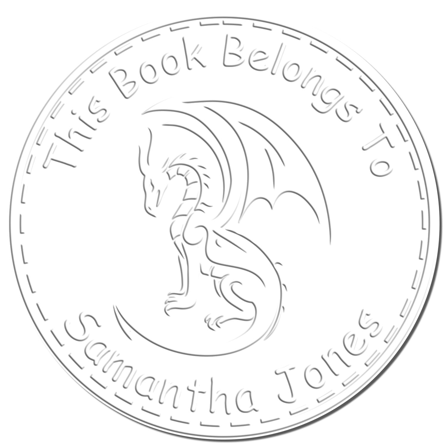 Circular silver stamp seal with a dragon emblem and engraved text, This Book Belongs to Samantha Jones.
