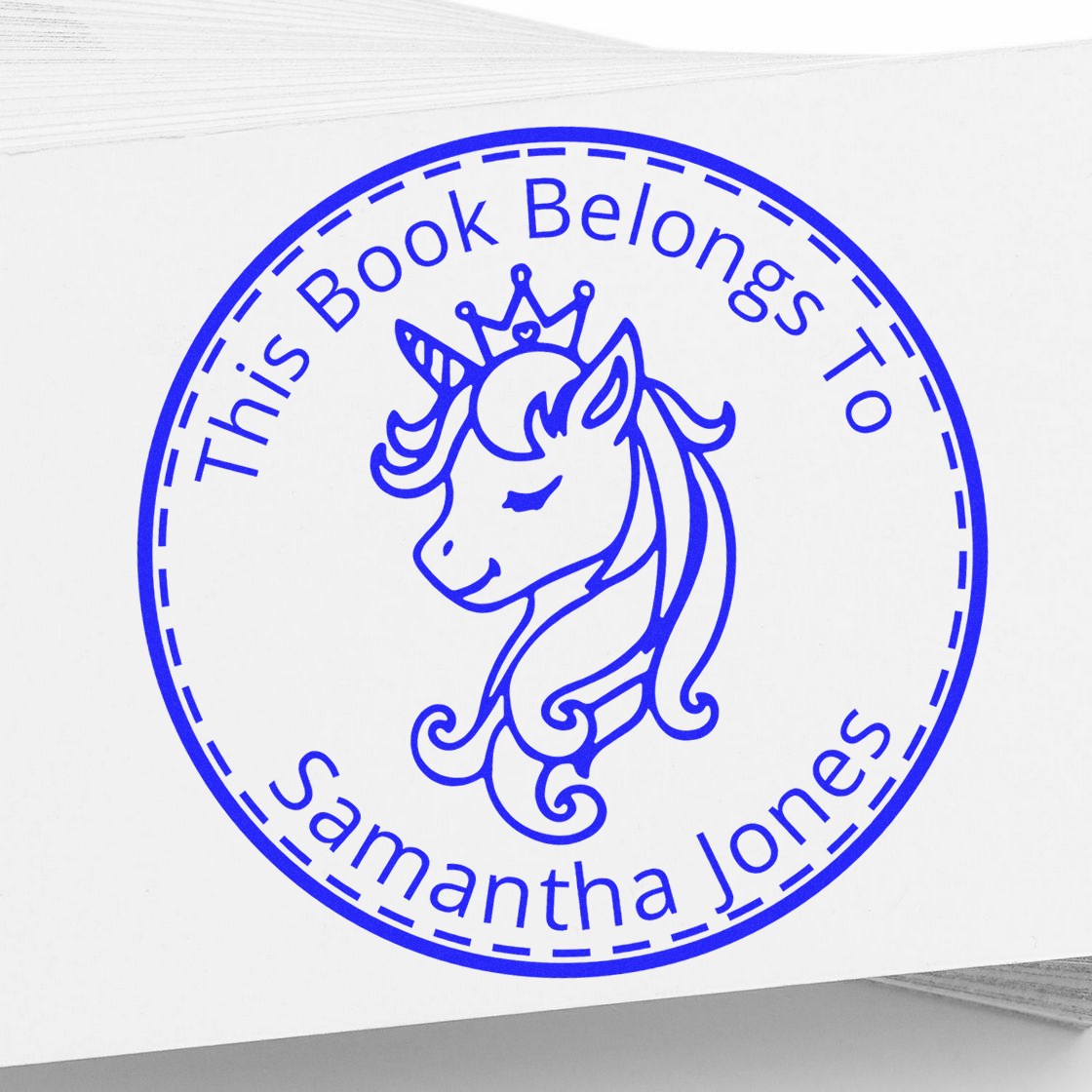Blue circular self-inking book stamp with unicorn seal and text This Book Belongs To Samantha Jones