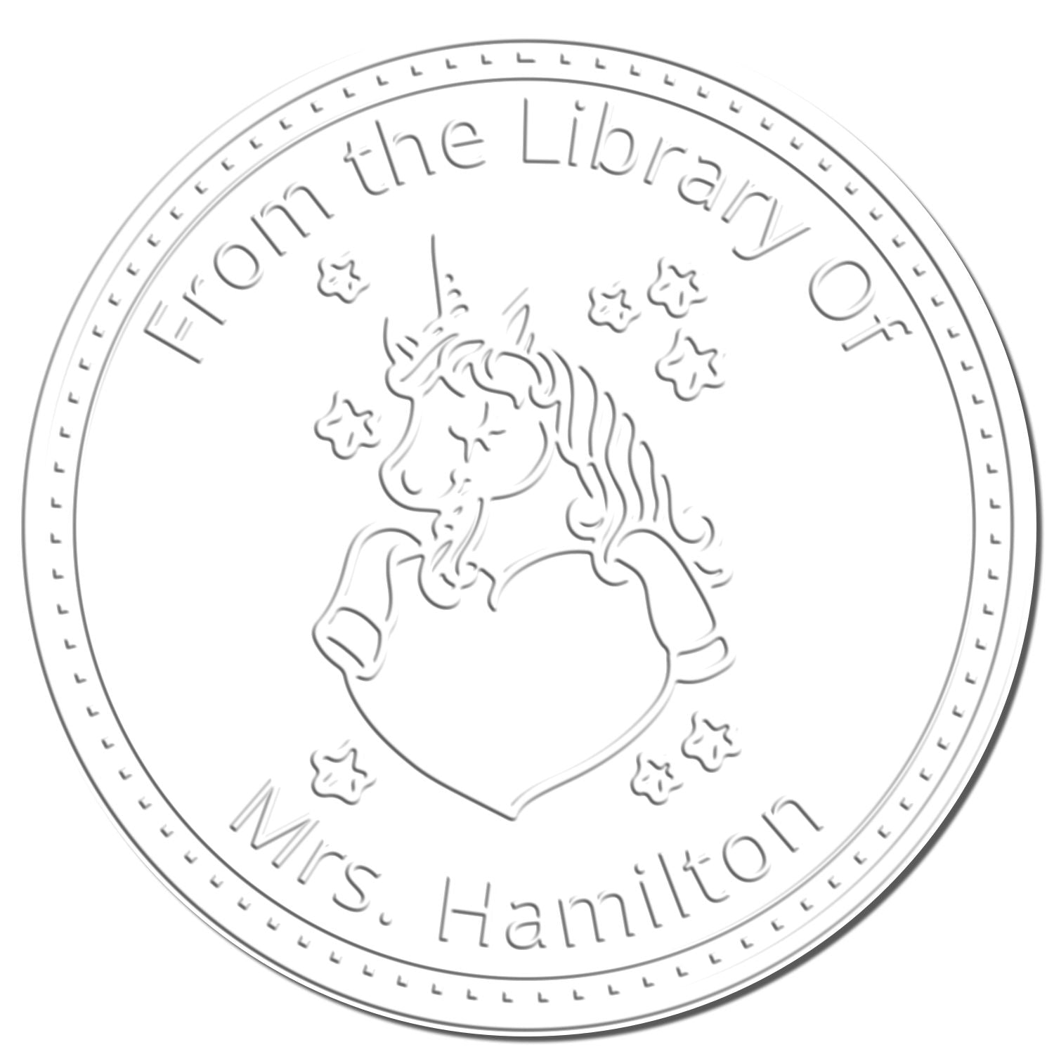 Circular silver embossing seal stamp with unicorn and stars, reading From the Library Of Mrs. Hamilton.