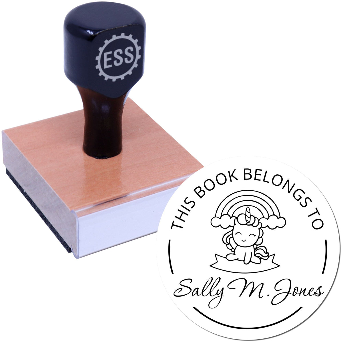 Navy self-inking stamp on a wooden block with a round custom book seal, unicorn design, and Sally M. Jones name.