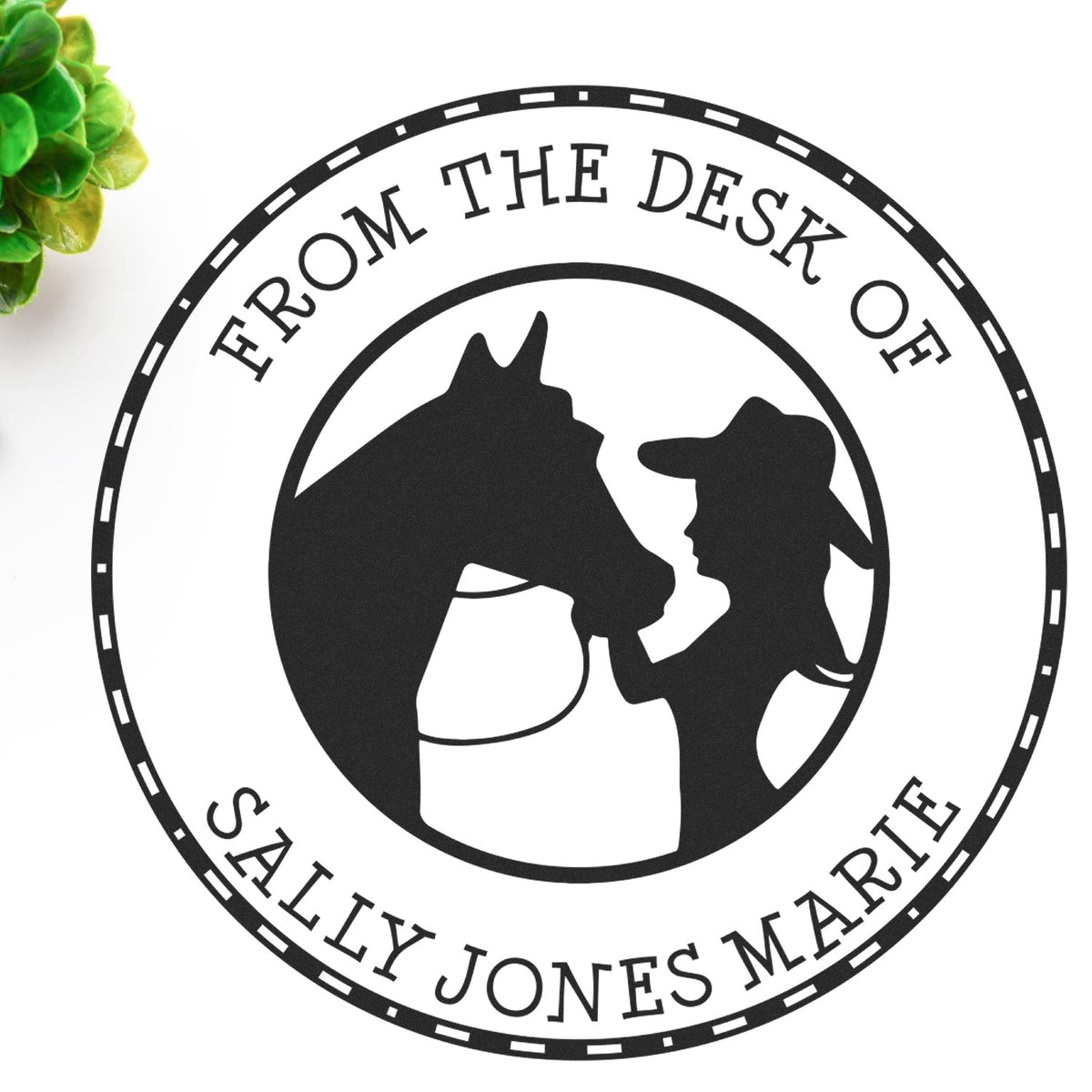 Black circular custom rubber stamp seal with horse and cowboy silhouette and From the Desk of Sally Jones Marie on white background.