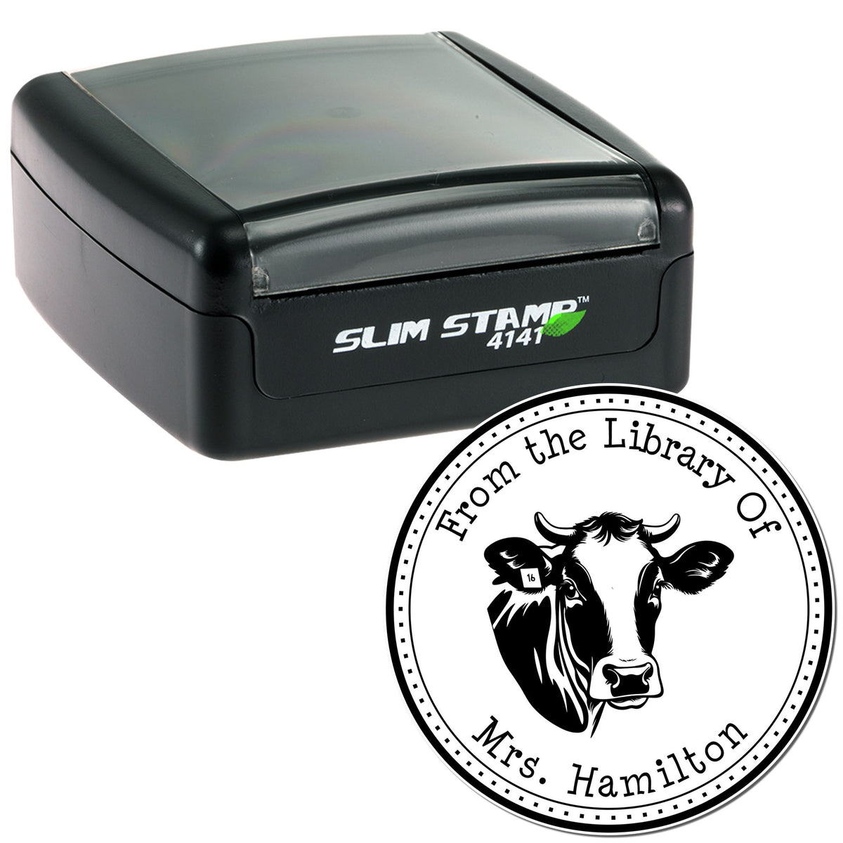Black Slim Stamp 4141 self-inking stamp with custom round library seal, white text, and cow graphic on white background.