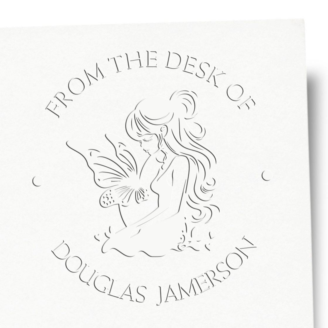White embossed stamp seal featuring a girl and butterfly, with circular text: From the Desk of Douglas Jamerson.