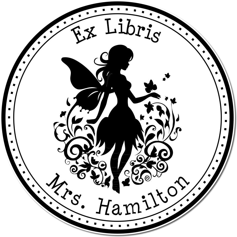 Black-and-white circular Ex Libris stamp seal with fairy silhouette, floral swirls, and Mrs. Hamilton text.