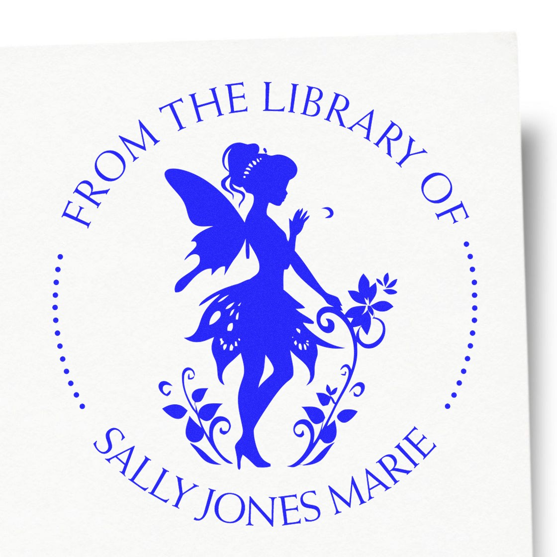 Blue personalized library stamp seal with fairy silhouette, floral accents, and curved text From the Library of Sally Jones Marie