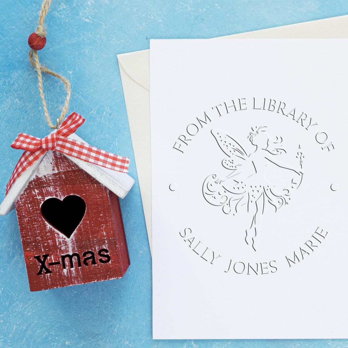 ESS Tansy Magical Fairy Handheld Personalized Book Insignia Seal used on a letter, featuring intricate fairy and fantasy-themed design.