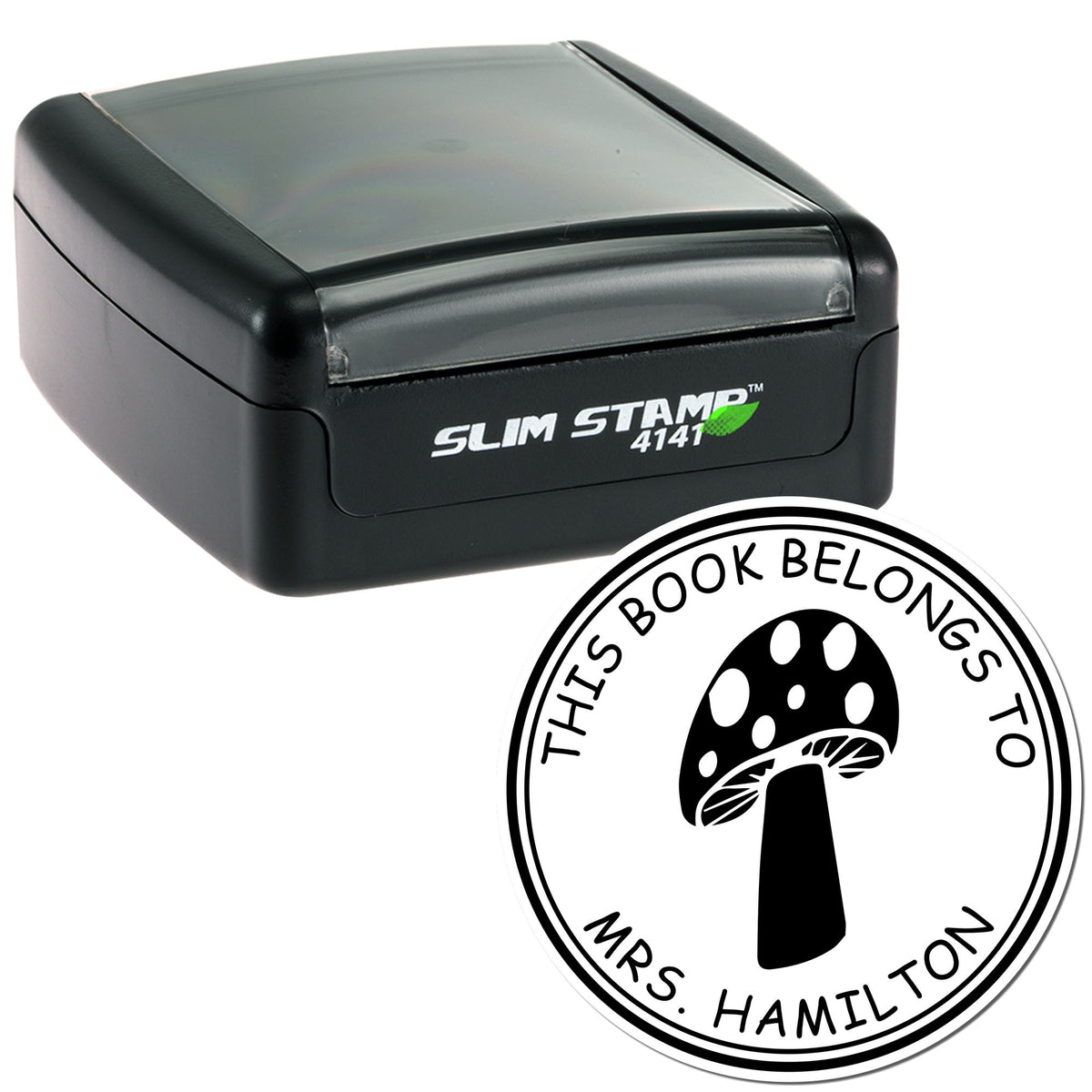 Black slim self-inking stamp with gray cap and circular Mrs. Hamilton book seal featuring a mushroom design.