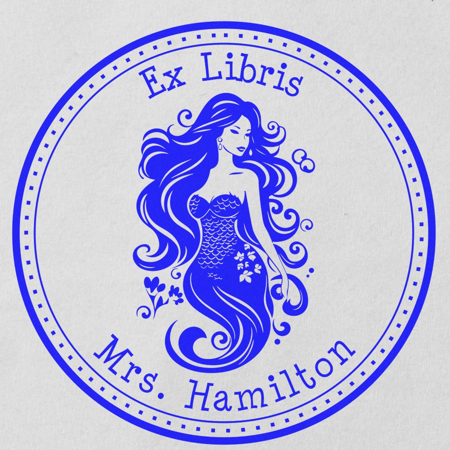Blue circular Ex Libris stamp seal featuring a mermaid and Mrs. Hamilton text.