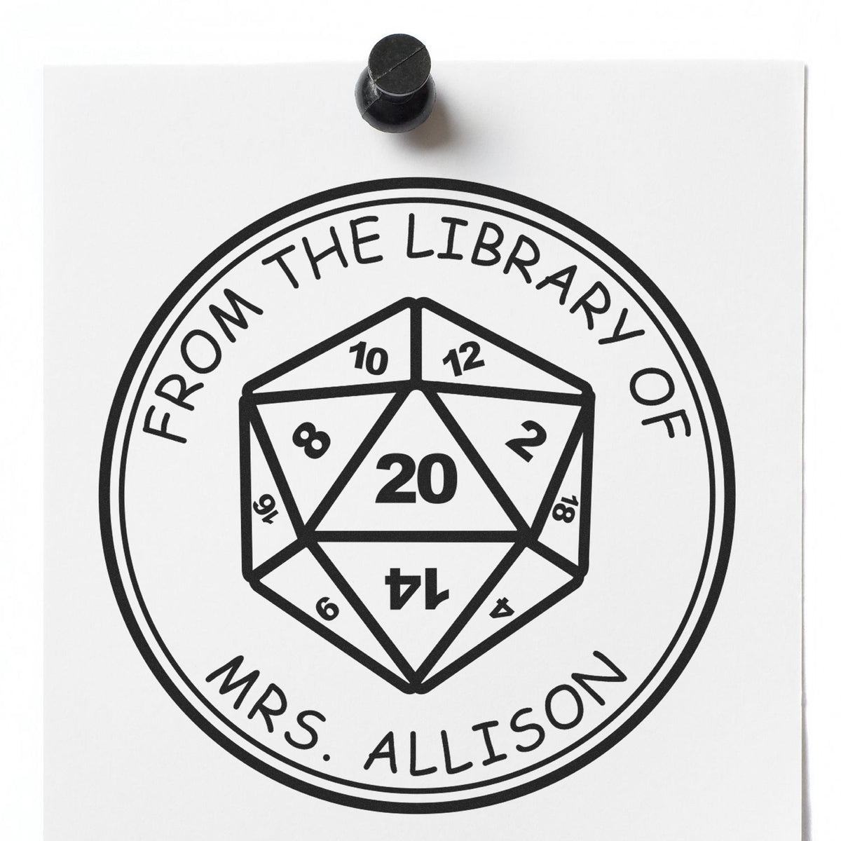 Black circular library stamp seal with 20-sided dice design and From the Library of Mrs. Allison on white paper.