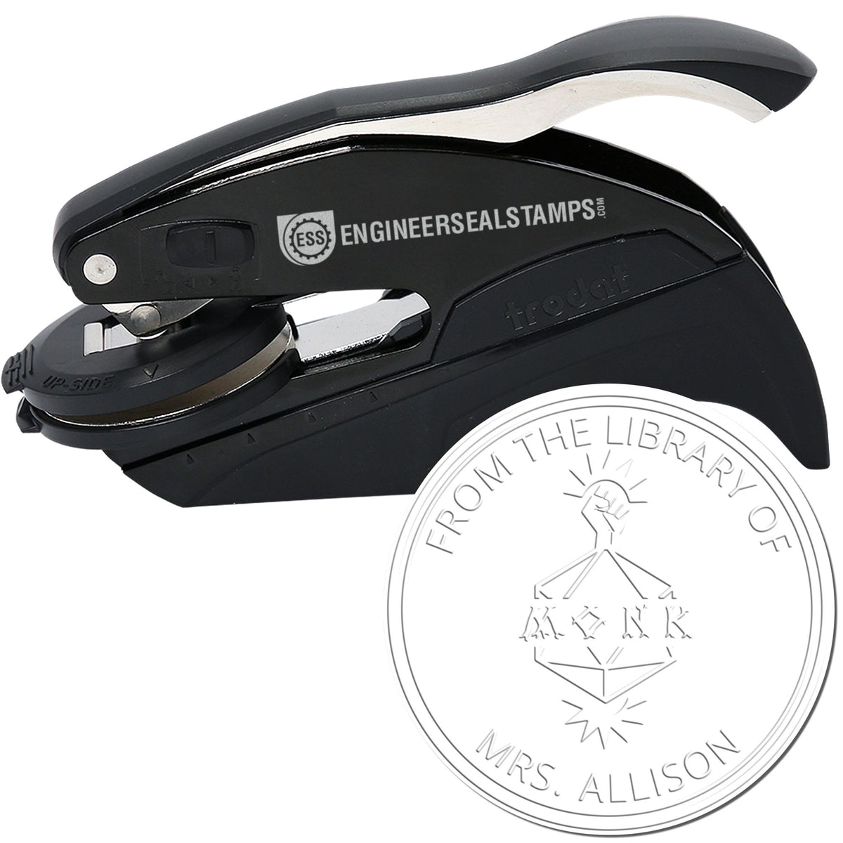 Black self-inking embossing stamp with silver accents and round library seal reading From the Library of Mrs. Allison