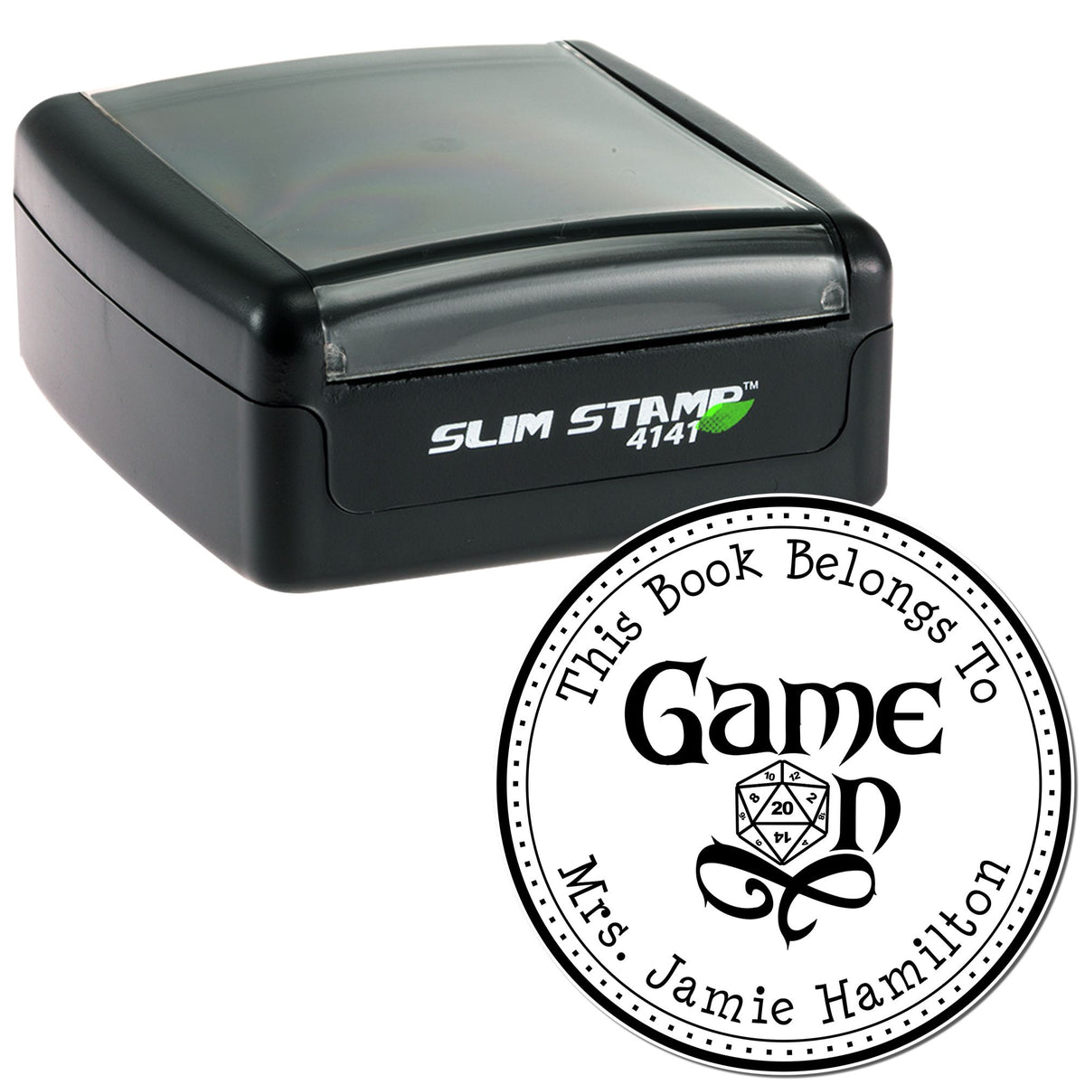 Black Slim Stamp 4141 self-inking stamp beside a round white-and-black seal for Jamie Hamilton's Game Book.