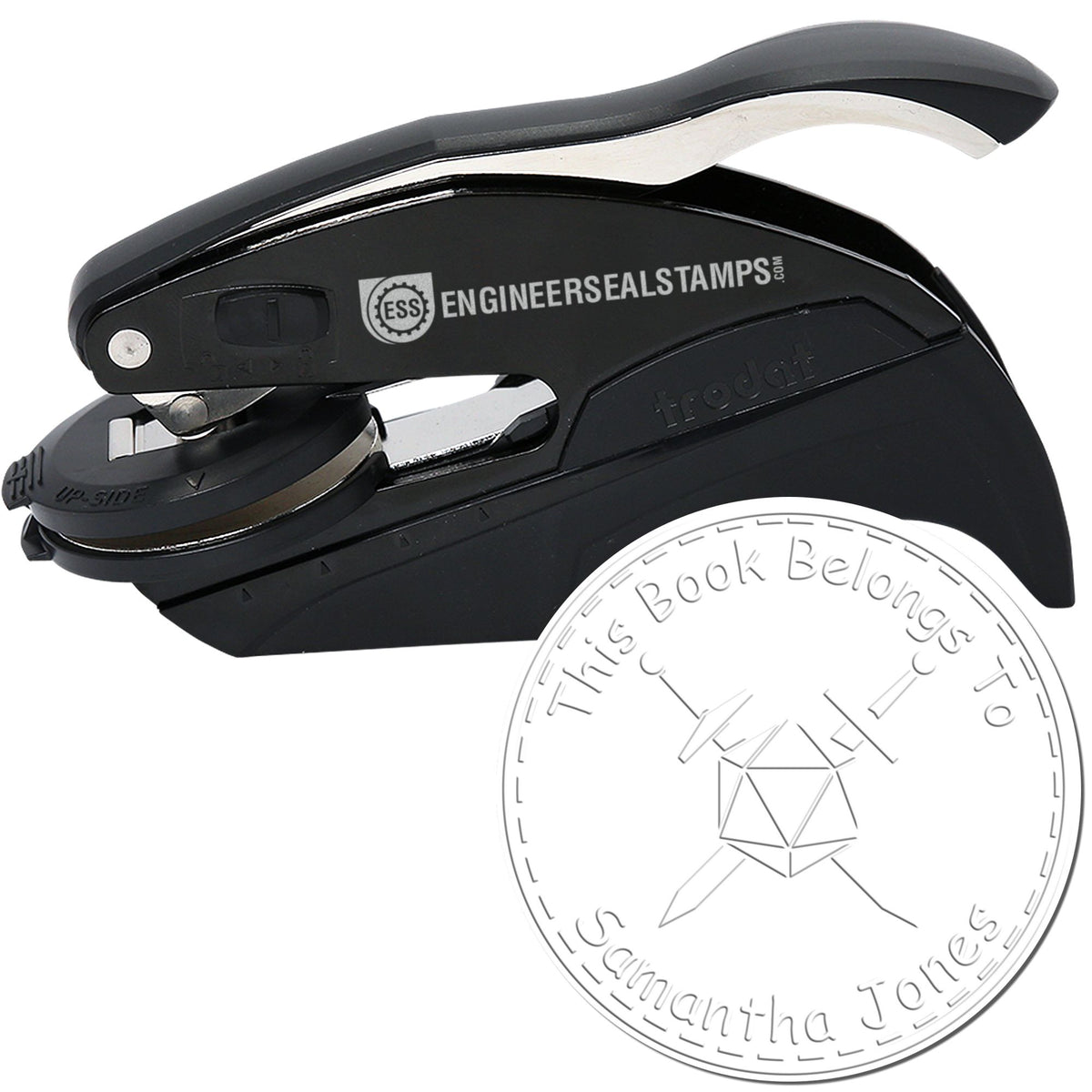 Black self-inking stamp and embossing seal with silver accents, showing a circular custom book plate design.